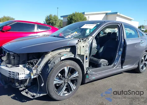 2017 Honda Civic Touring из США, поврежденный, VIN 2HGFC1F98HH659062